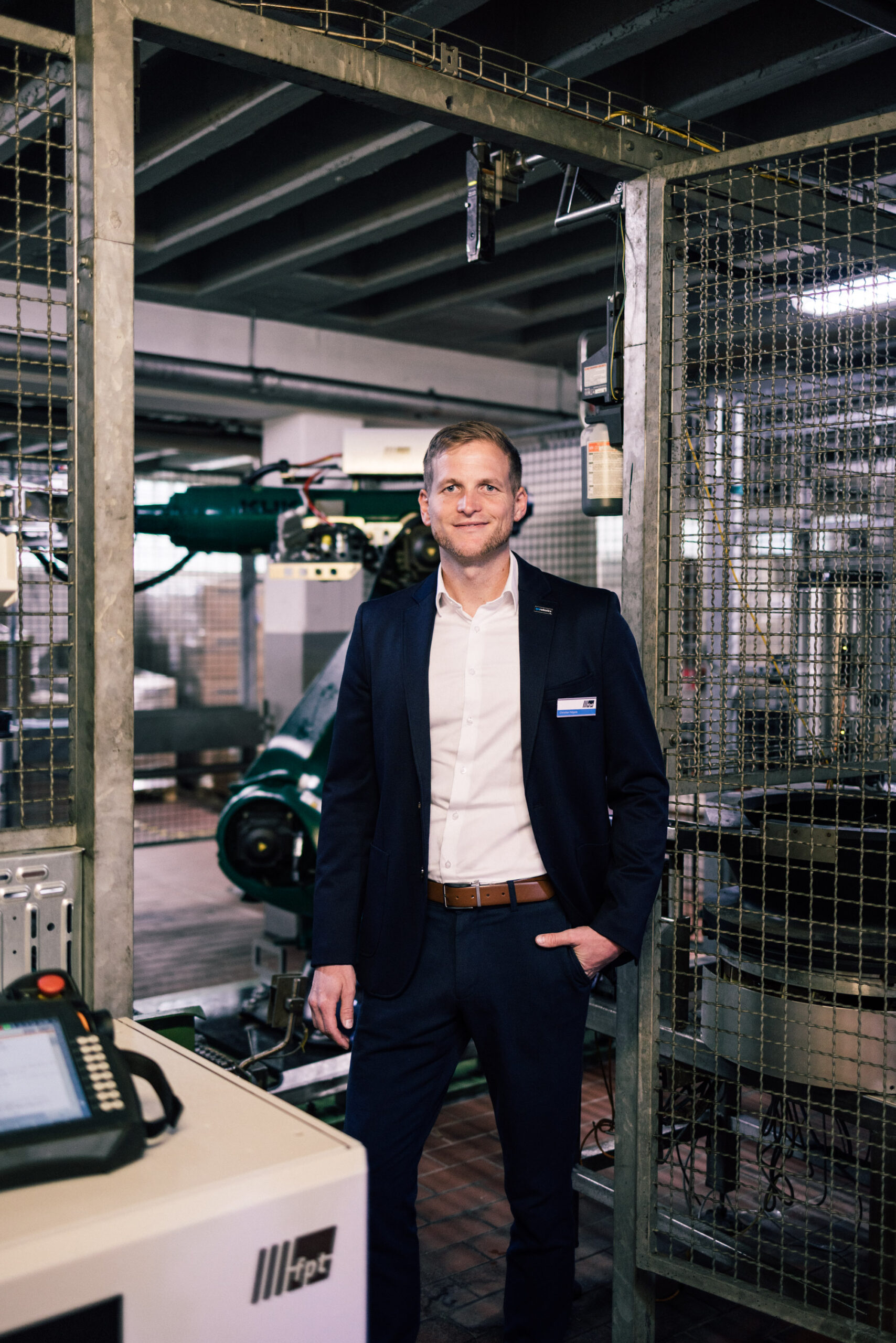 Picture of our service manager Christian Nägele at the customer's system