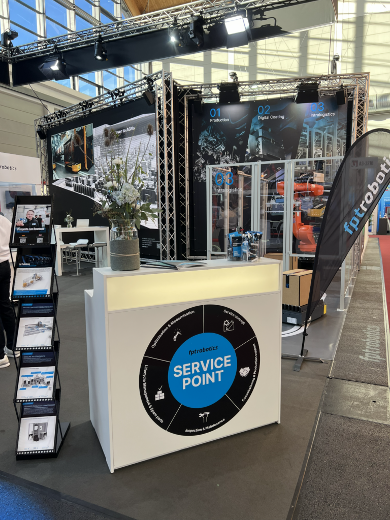 Messestand auf der Fakuma in Freidrichshafen von fpt robotics